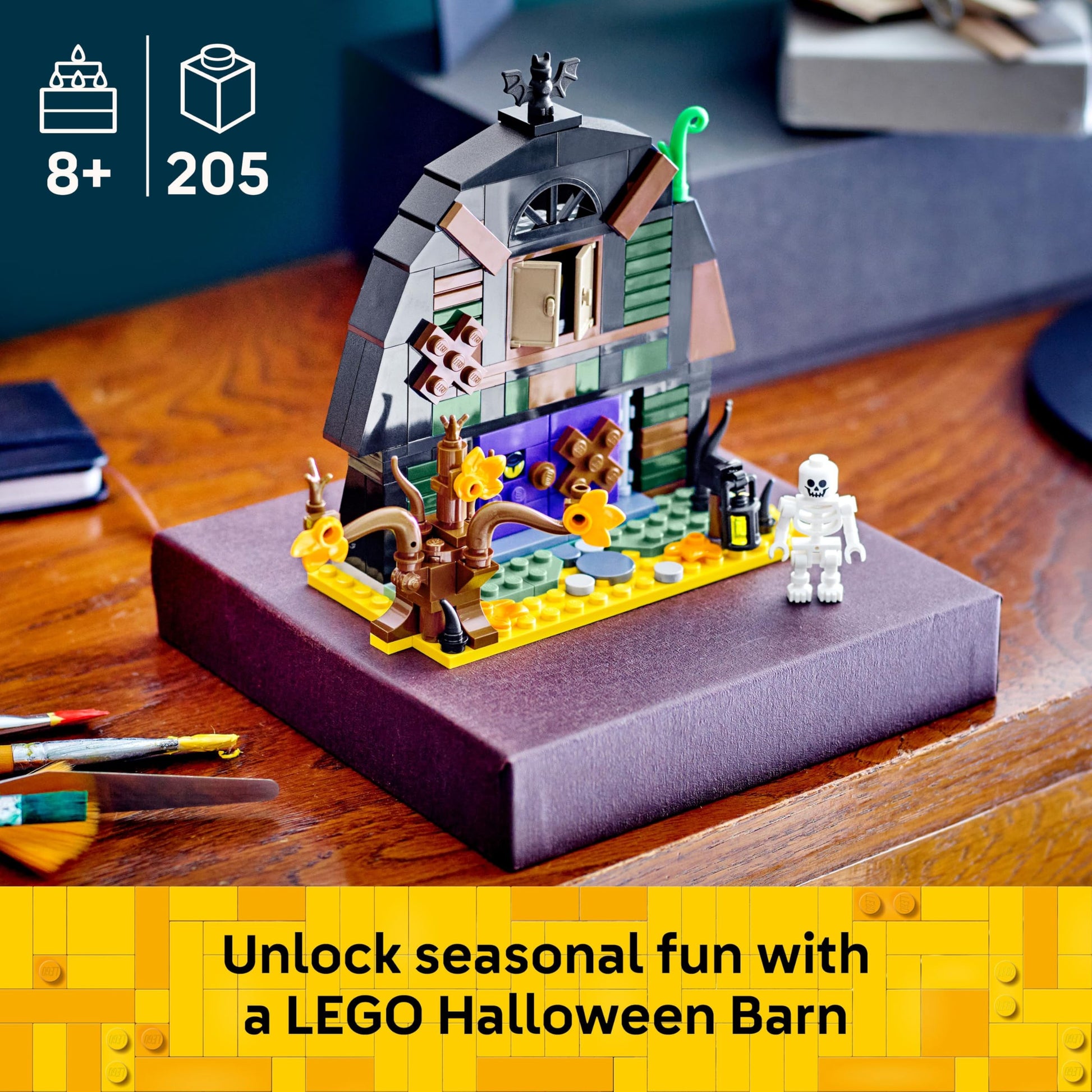 LEGO Halloween Barn with skeleton minifigure, bat, and spooky lamps, perfect for creative play for kids aged 8 and up.