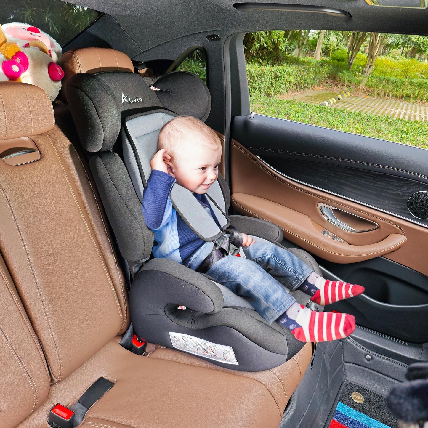 Alivio adjustable car seat for toddlers and kids, with padded soft fabric, 3-layer headrest, and recline feature for comfort.