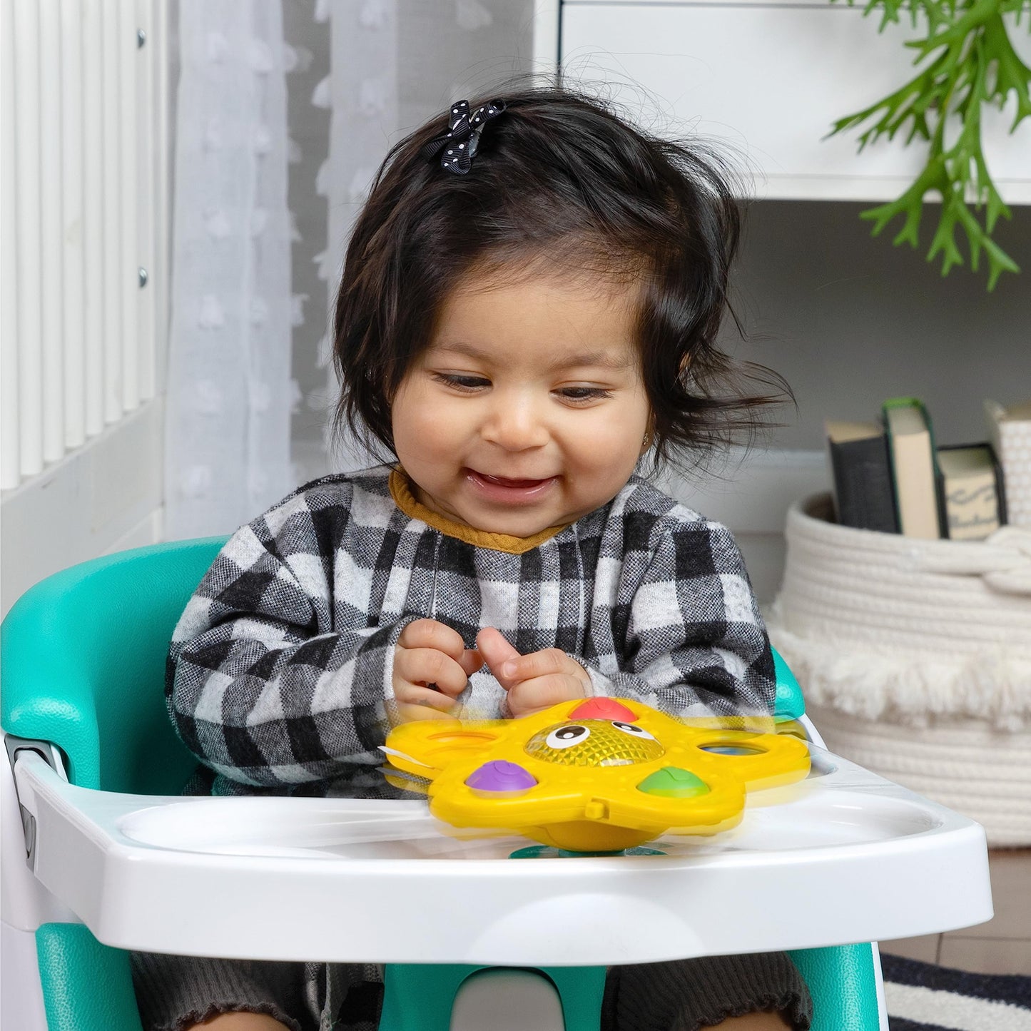 Baby Einstein Ocean Explorers pop and glow starfish sensory toy with light-up features for babies 6 months and older.