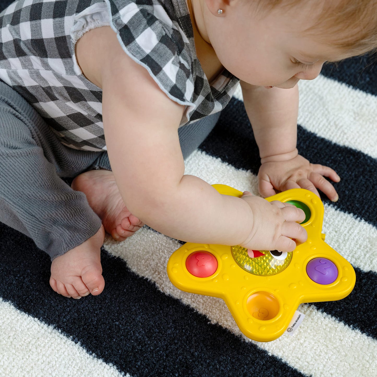 Baby Einstein Ocean Explorers starfish sensory popper toy with glowing lights, designed for babies 6 months and older.
