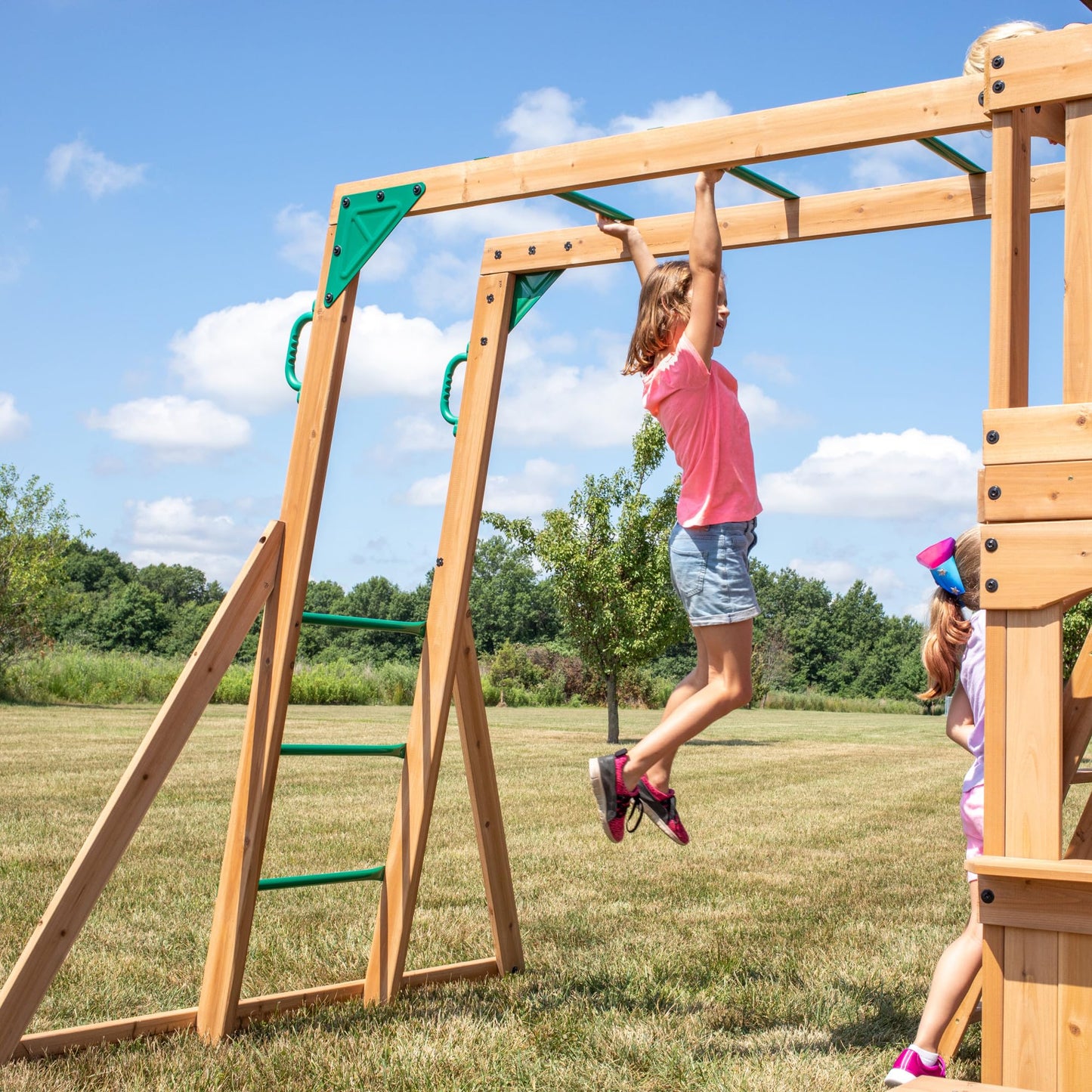 Backyard Discovery Montpelier 100% Cedar Wood Swing Set | Outdoor Playground for Kids | Garden Climbing Frame for Children | 1 Trapeze and 2 Belt Swings | 2.4m Wave Slide | Moneky Bars