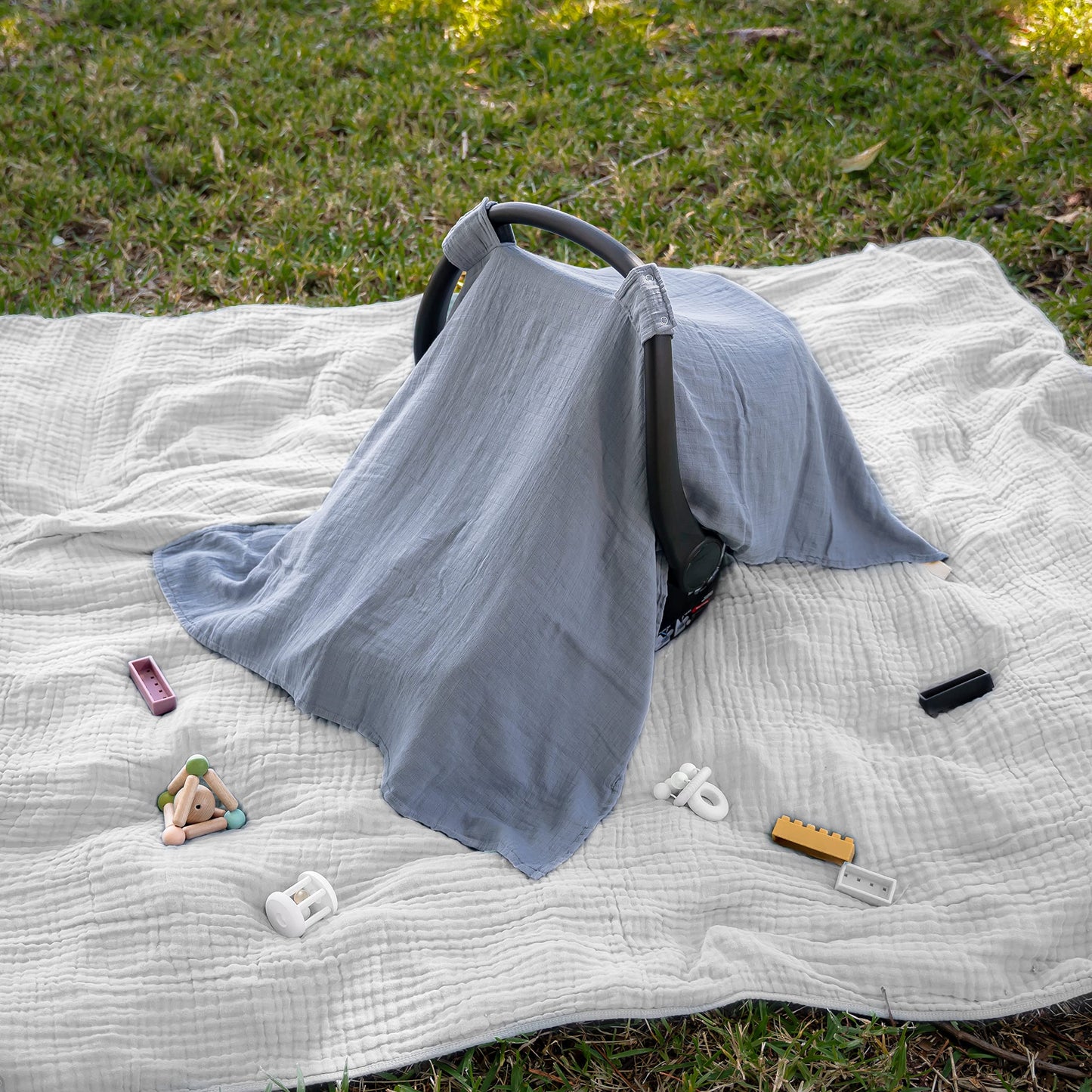 Comfy Cubs muslin cotton baby car seat cover in Pacific Blue, soft, breathable, and lightweight infant sun canopy for travel.
