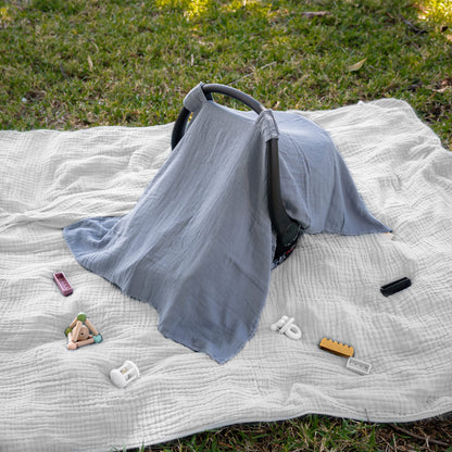 Comfy Cubs muslin cotton baby car seat cover in Pacific Blue, soft, breathable, and lightweight infant sun canopy for travel.