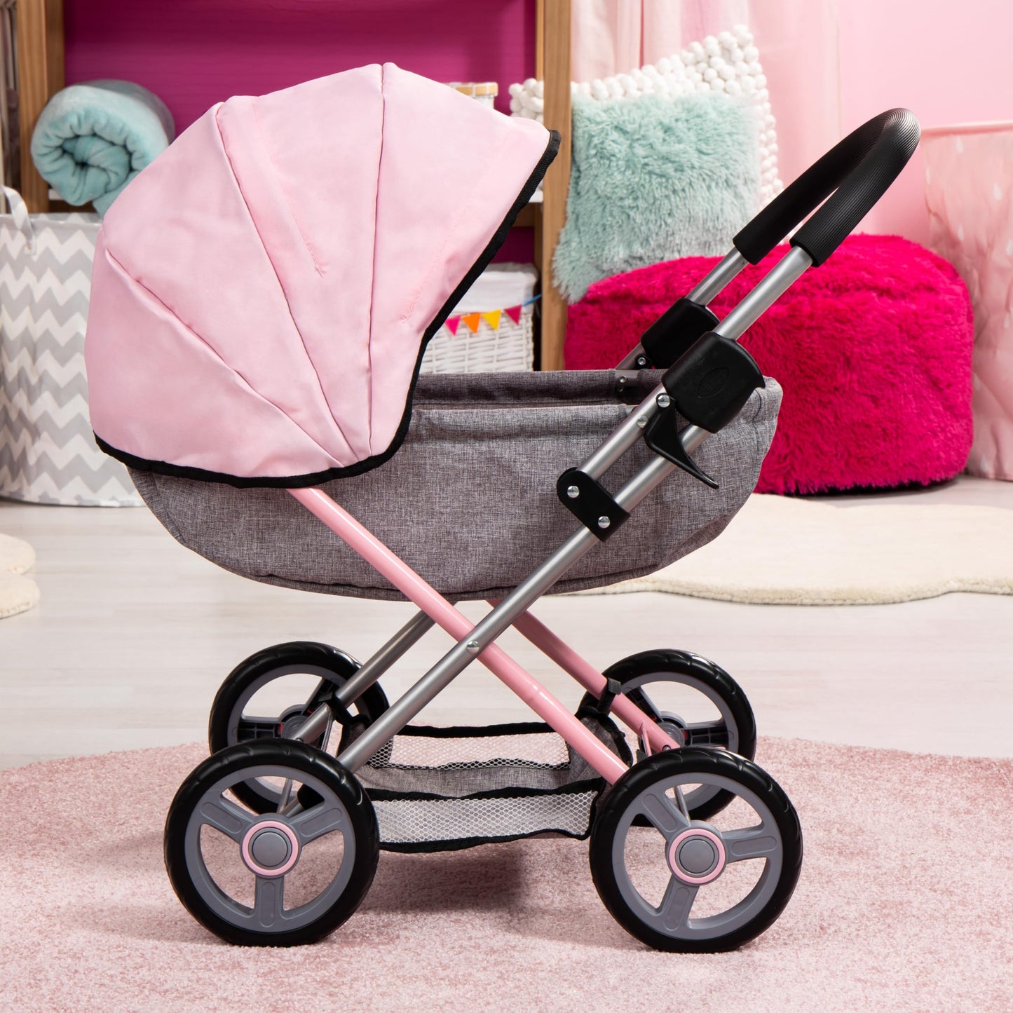 Bayer Cosy baby doll pram with large wheels, foldable design, storage basket, changing bag, and matching accessories for 46cm dolls.