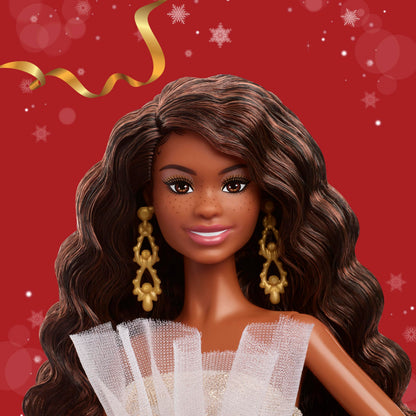 Barbie Signature 2025 Holiday fashion doll with black hair in a silver and gold gown, displayed in collectible packaging.
