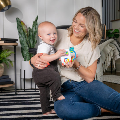 Baby Einstein Ocean Explorers musical light-up toy for babies 3+ months, featuring colorful ocean-themed design and melodies.