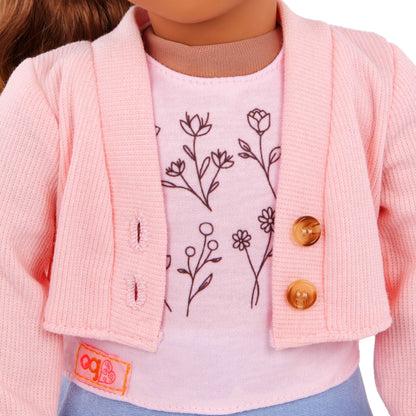 Our Generation 18-inch doll outfit featuring a pink sweater, blue skirt, and floral print top for pretend play.