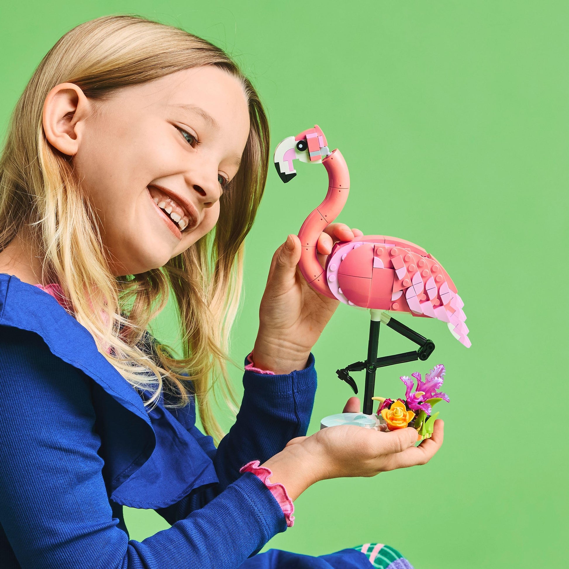 LEGO Creator 3in1 Wild Animals set featuring a pink flamingo, cockatoo parrot, and axolotl toy figures.