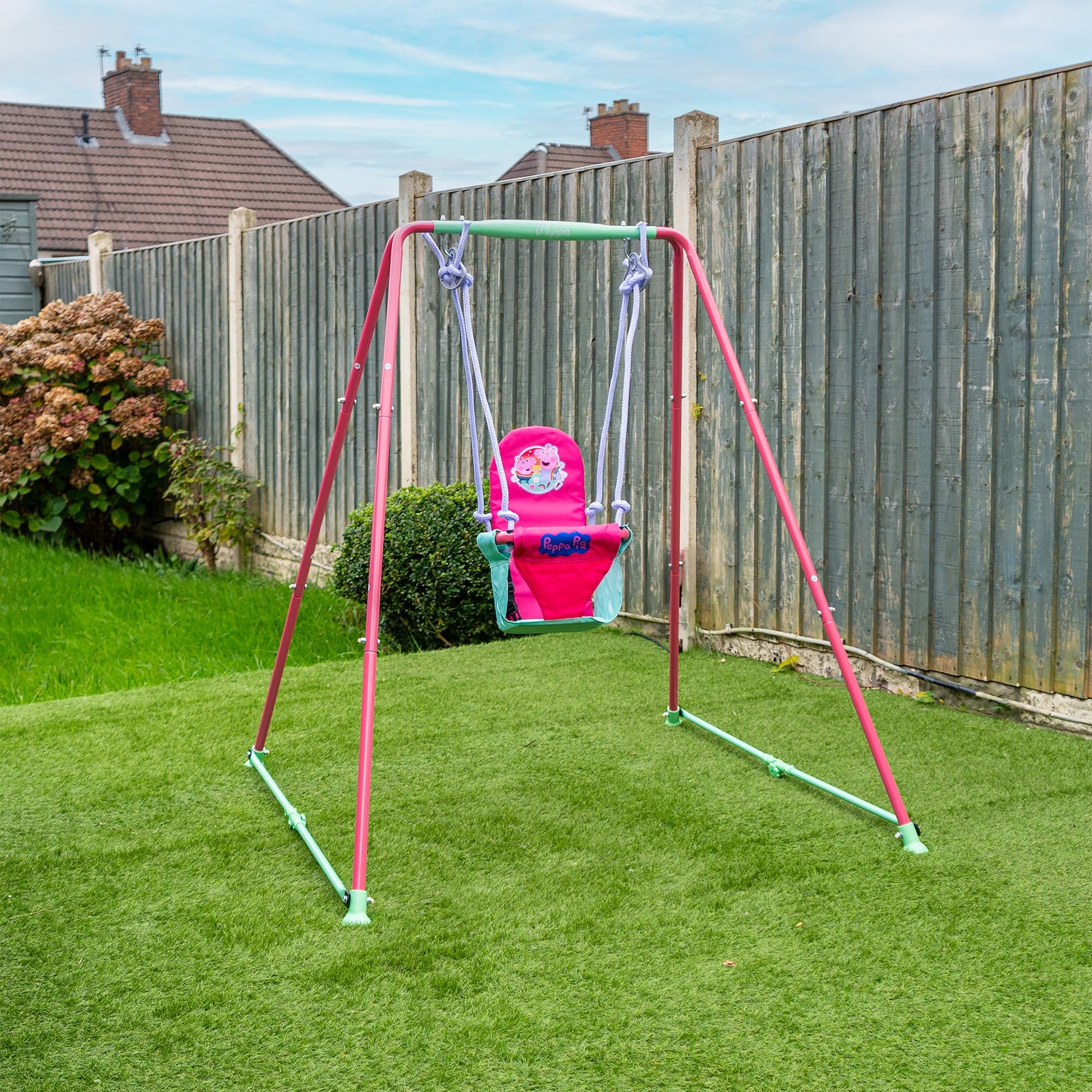 Peppa Pig fast folding baby swing set with adjustable seat and safety harness, suitable for indoor and outdoor use for toddlers 6-36 months.