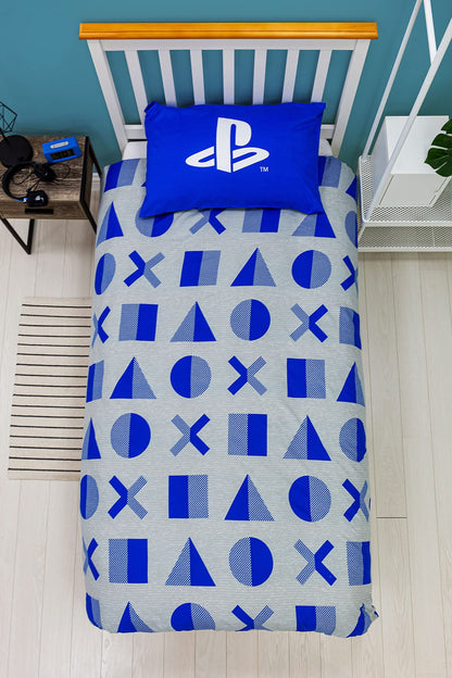 PlayStation official reversible duvet cover with layered design, featuring gaming graphics, includes pillowcase, for single bed.
