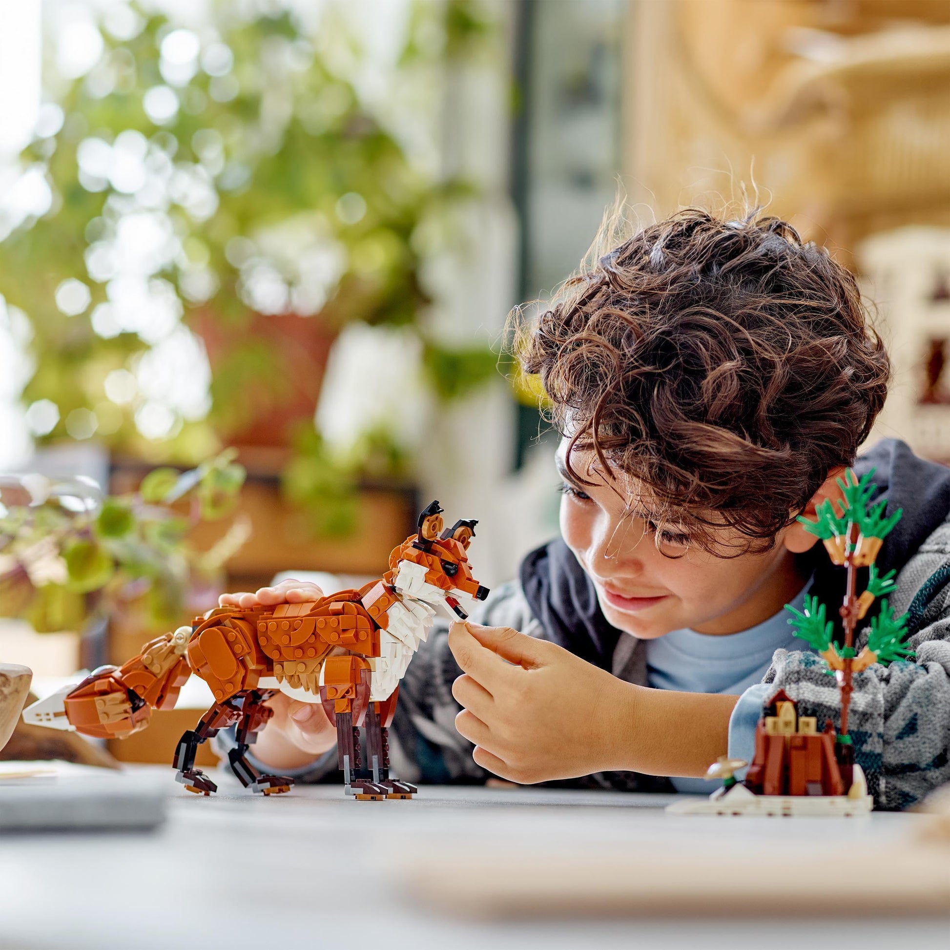 LEGO Creator 3in1 Forest Animals set featuring a red fox, owl, and squirrel models for creative play and decor.