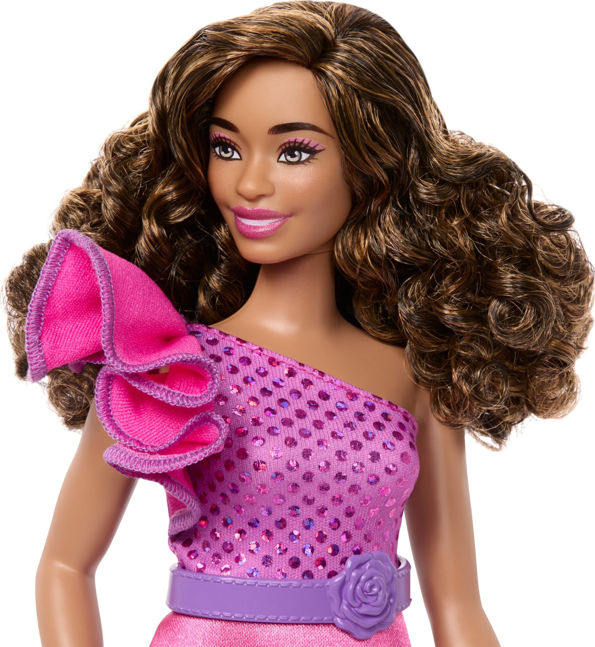 Barbie Fashionistas Doll #225 with curvy body, brown hair, pink sparkly dress, and accessories, celebrating 65th anniversary.