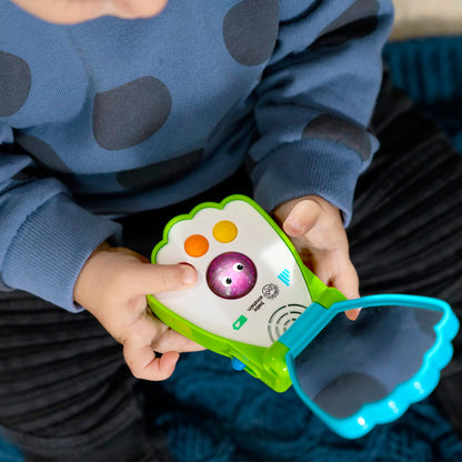 Baby Einstein Ocean Explorers Shell Phone musical toy for babies, featuring colorful ocean-themed design and interactive buttons.