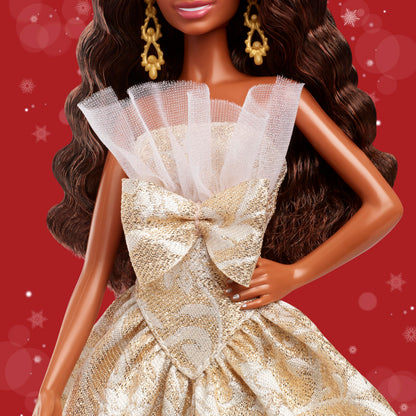 Barbie Signature 2025 Holiday black hair fashion doll in silver and gold gown, displayed in collectible packaging.