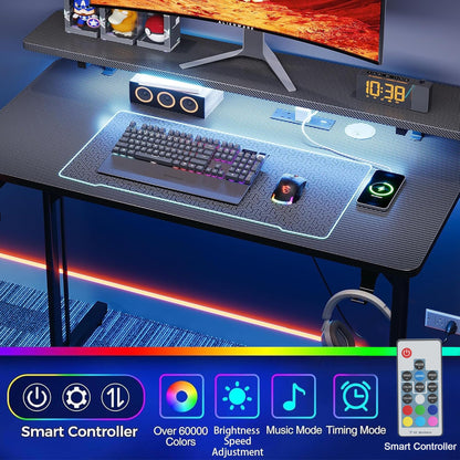 CAIYUN small gaming desk with LED lighting, power outlets, full monitor stand, black carbon fiber surface, metal frame for home office
