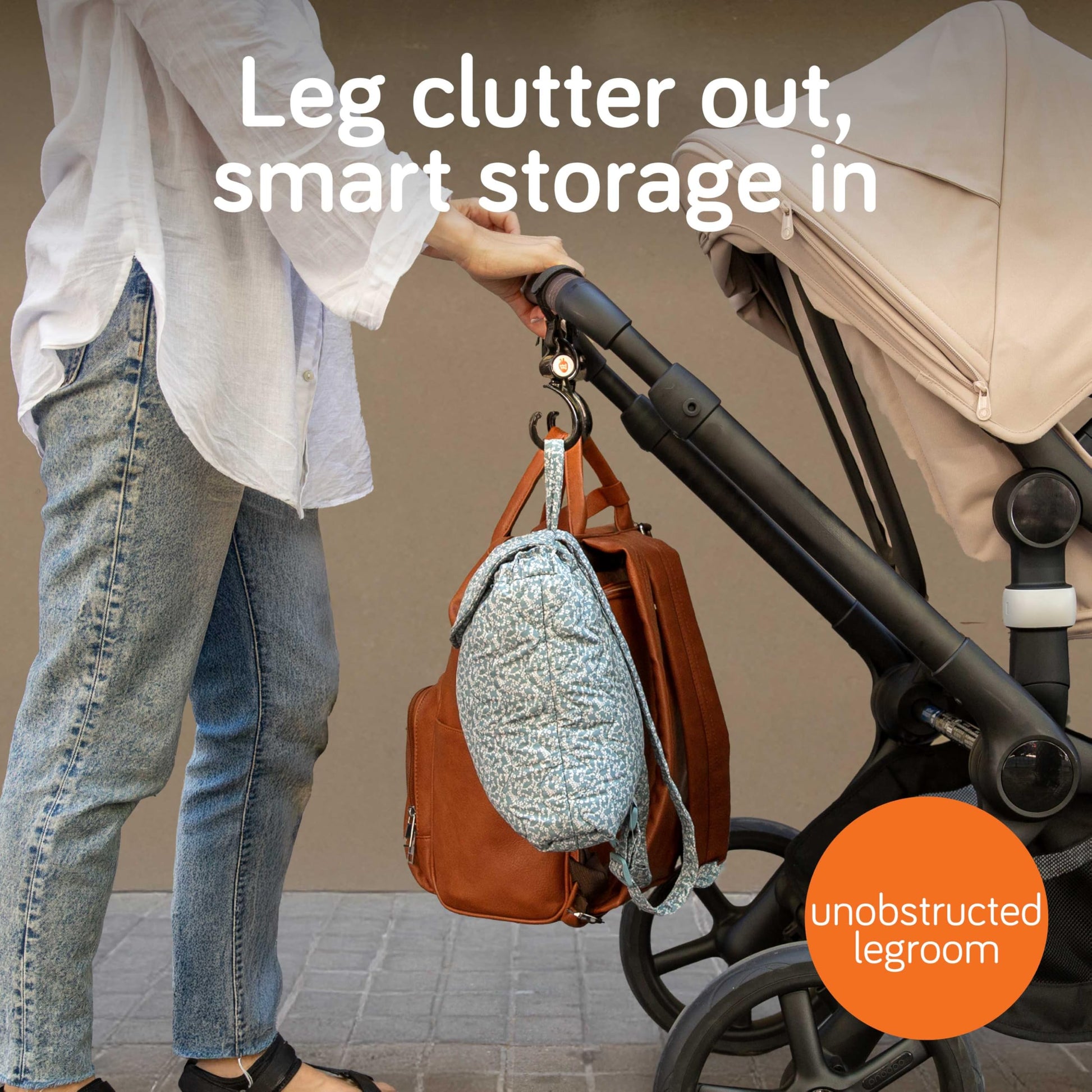 Baby Uma Buggy Clips in a 2-pack with swivel necks and strong straps attached to a pram, designed for secure stroller accessory holding.