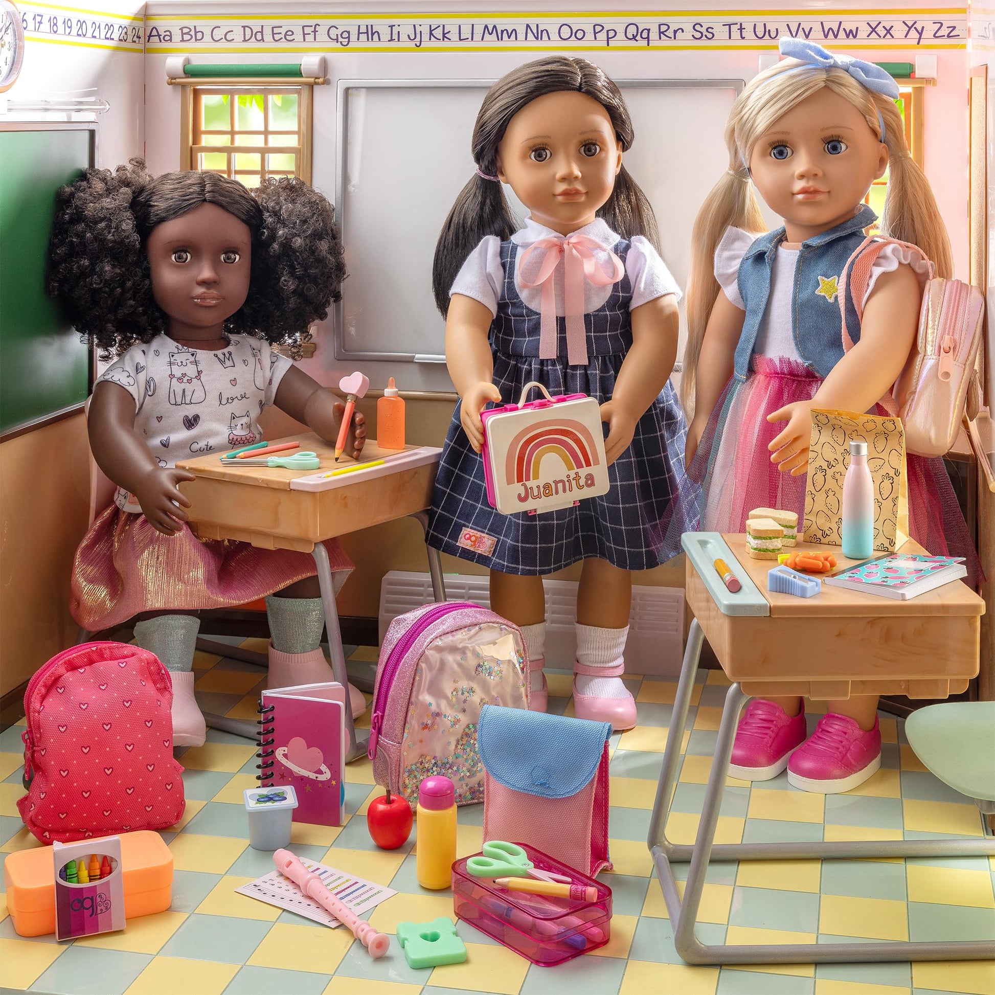 Our Generation 16-piece backpack and school supplies set for 18-inch dolls, featuring colorful accessories and a stylish backpack.