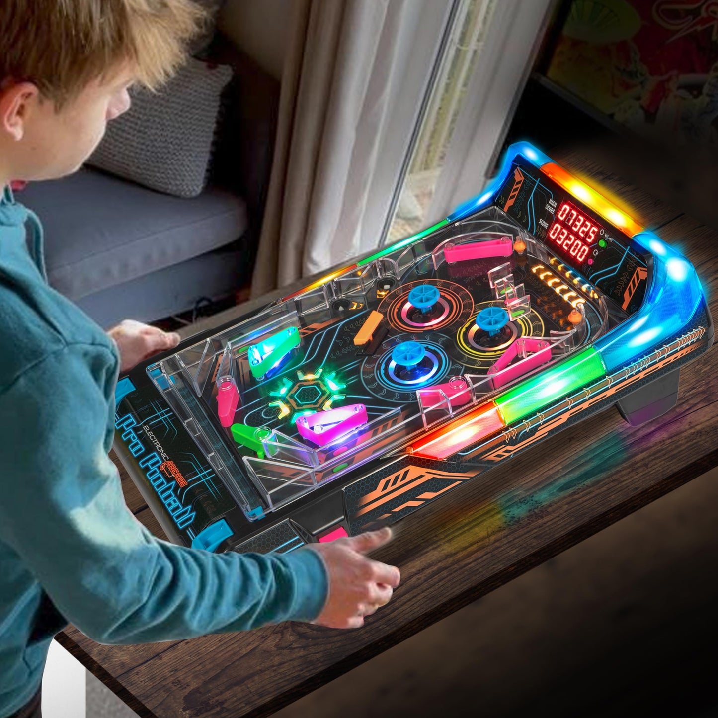 #winning electric arcade pinball machine Pro Edition, desktop pinball game with colorful playfield and metal controls on a black base.
