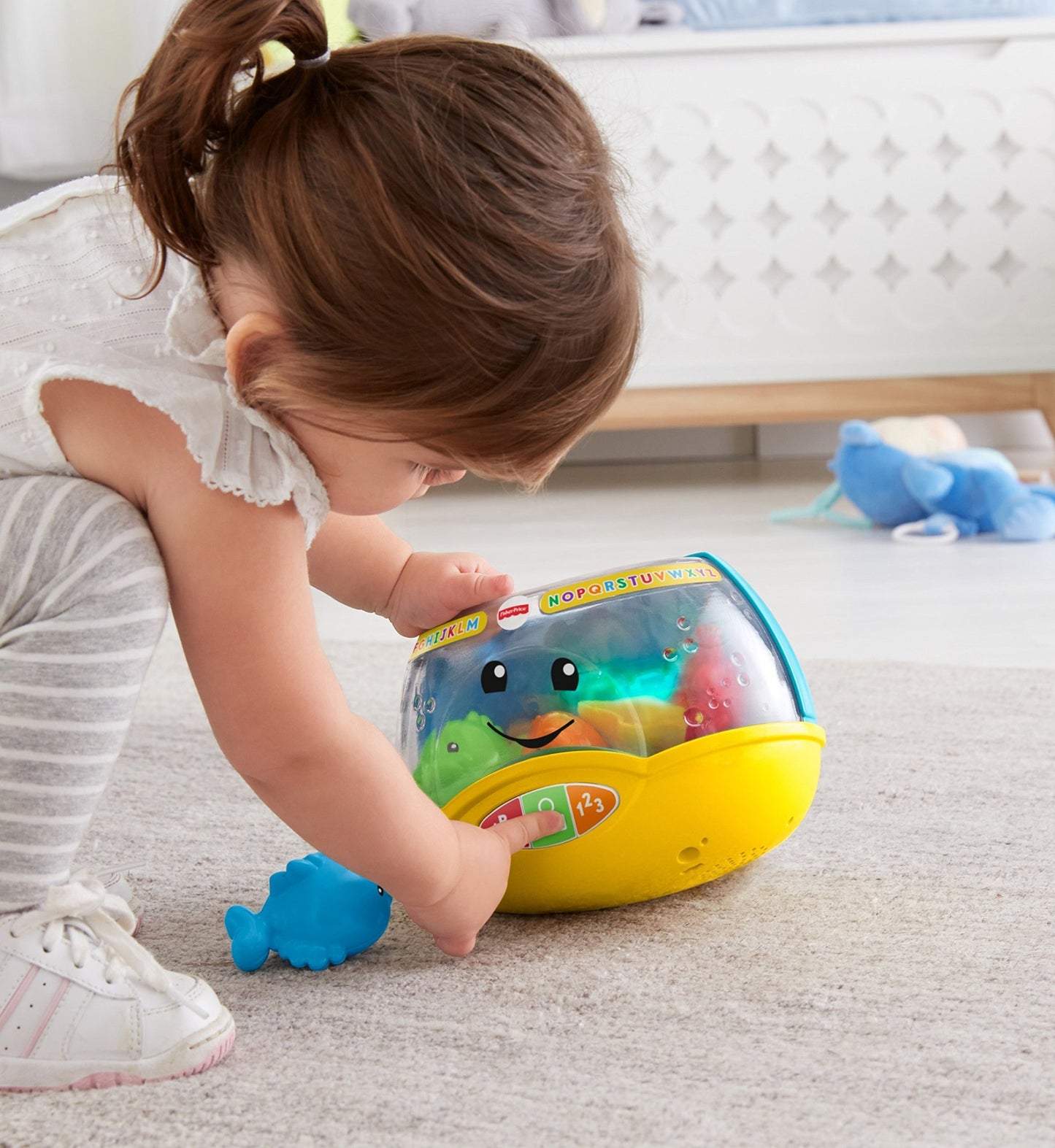 Fisher-Price Laugh & Learn Magical Lights Fishbowl toy for babies with colorful lights and Smart Stages learning content for infants 6+ months