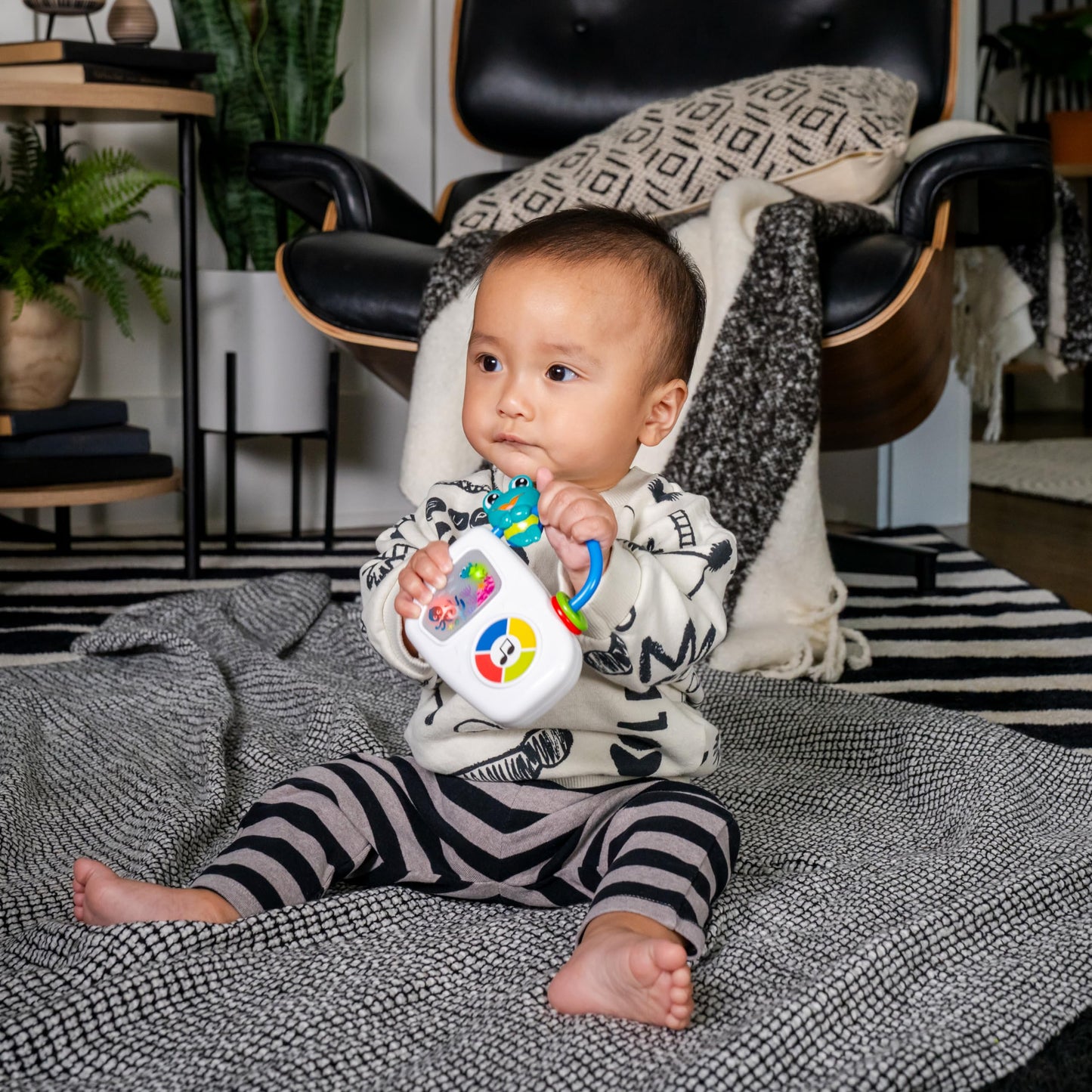 Baby Einstein Ocean Explorers musical light-up toy for babies 3+ months, featuring colorful ocean character designs and musical features.