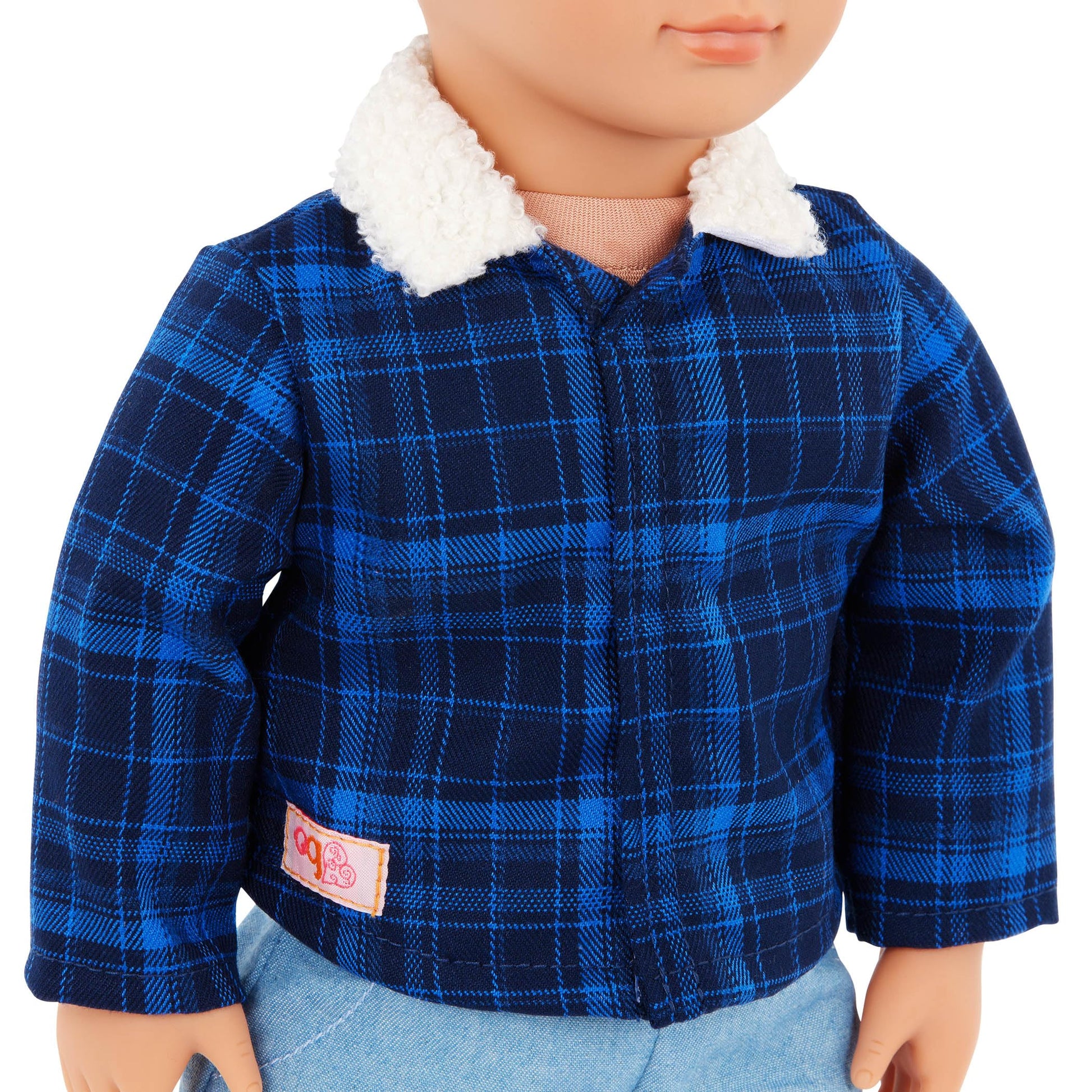Our Generation Dustin Cowboy Doll with cowboy hat, boots, and lifelike hazel eyes in western-themed outfit.