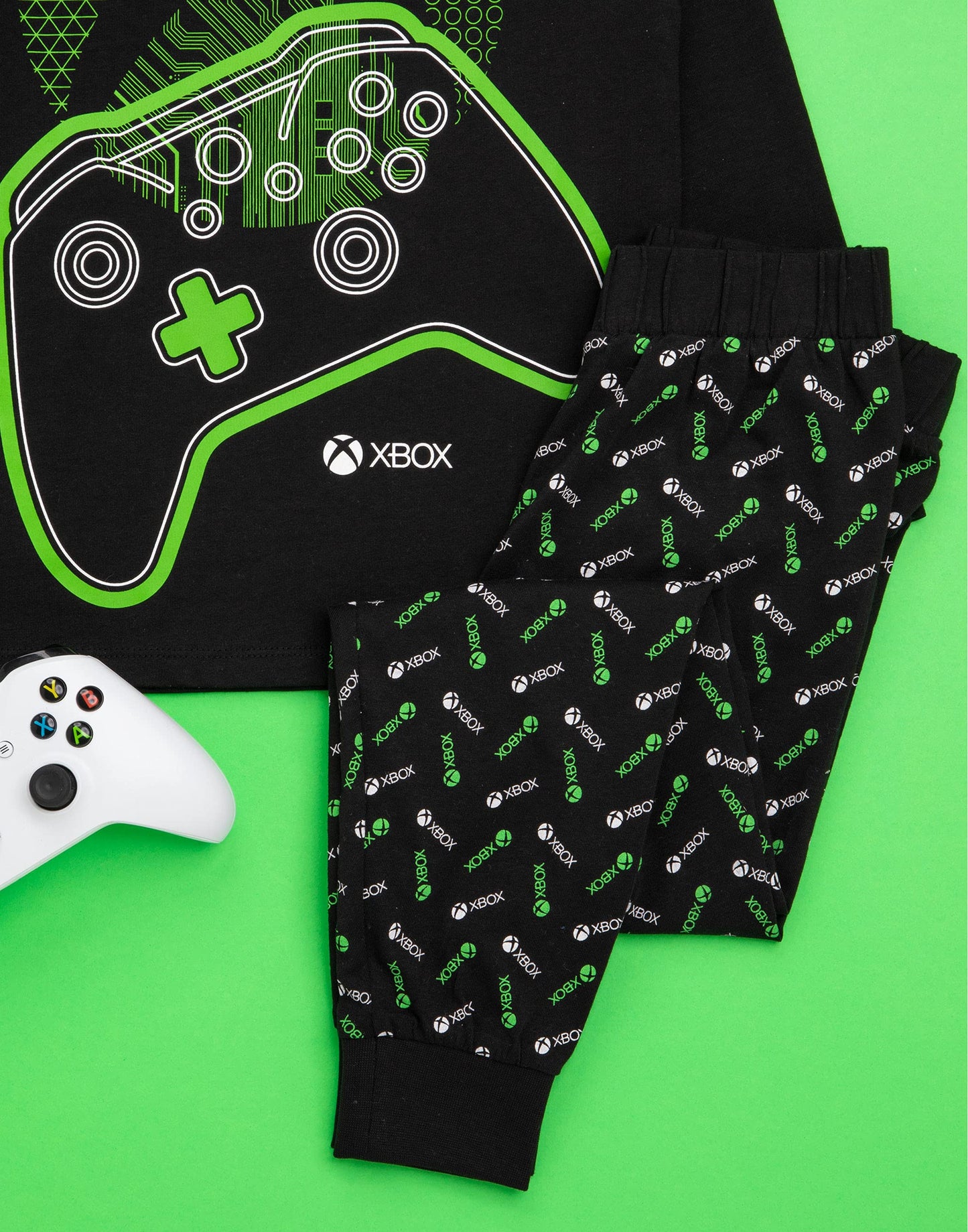 Xbox boys' pajamas set with black and green gamer T-shirt and matching leggings, featuring game controller graphics for kids aged 9-10.
