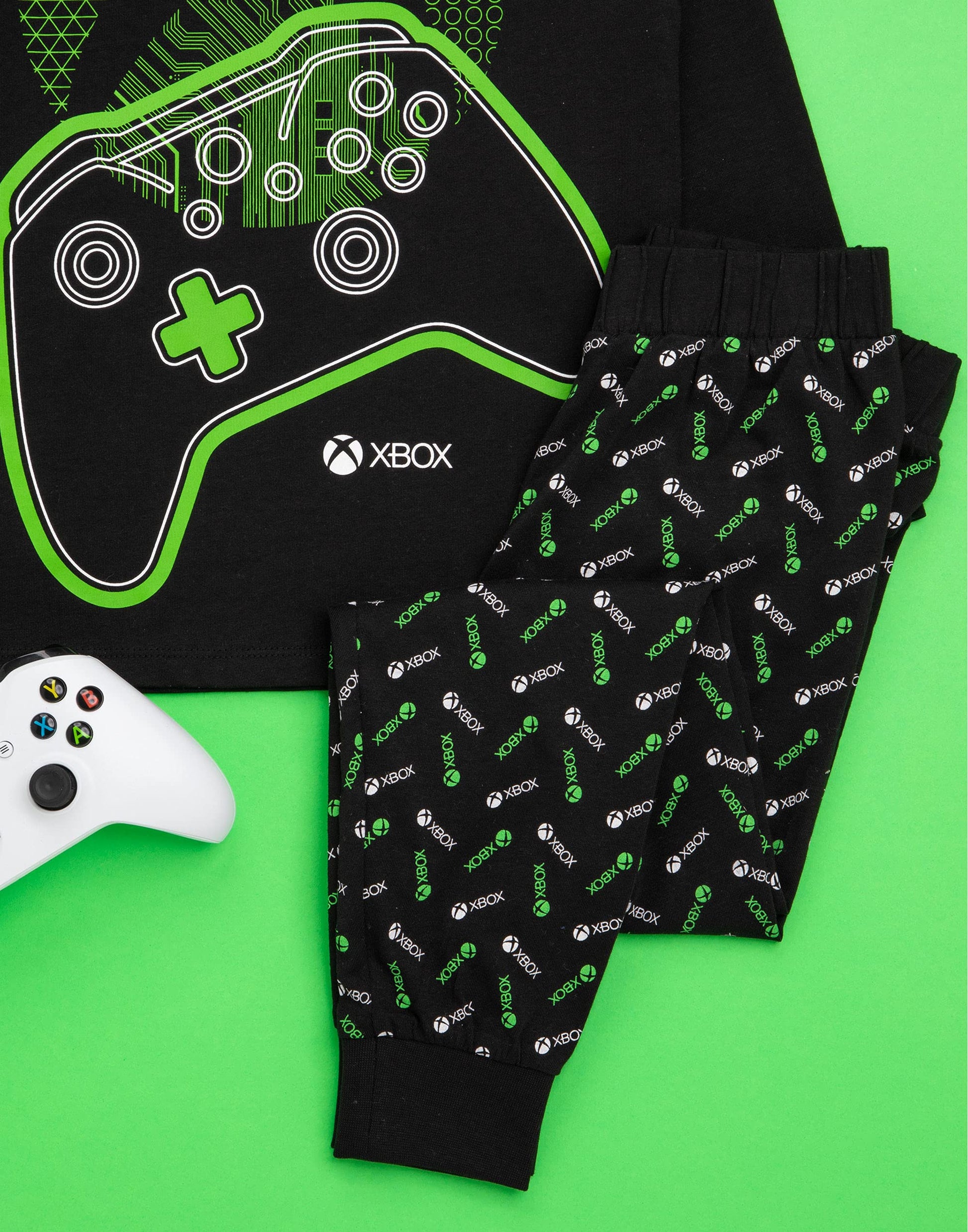 Xbox boys' pajamas set with black and green gamer T-shirt and matching leggings, featuring game controller graphics for kids aged 9-10.