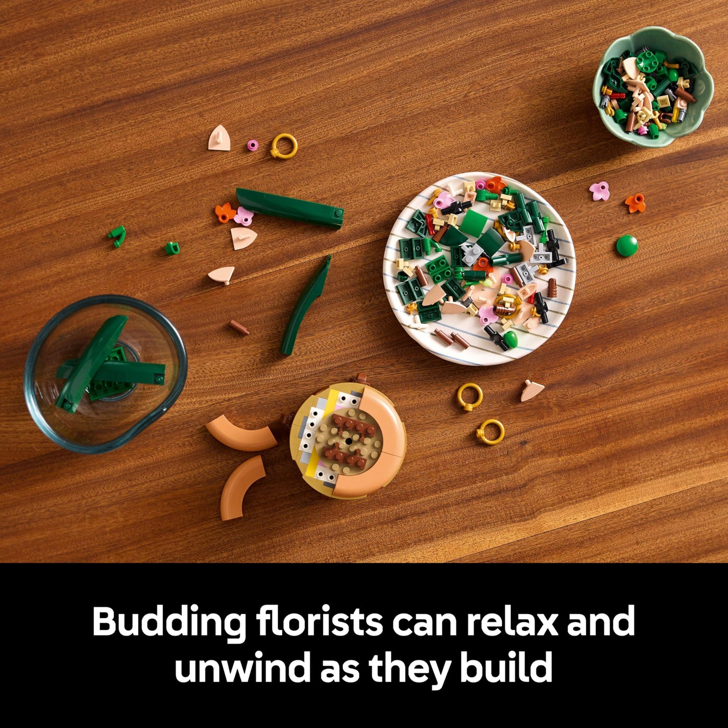 LEGO Botanicals Mini Orchid set in a terracotta pot, featuring vibrant artificial flowers for indoor decor.