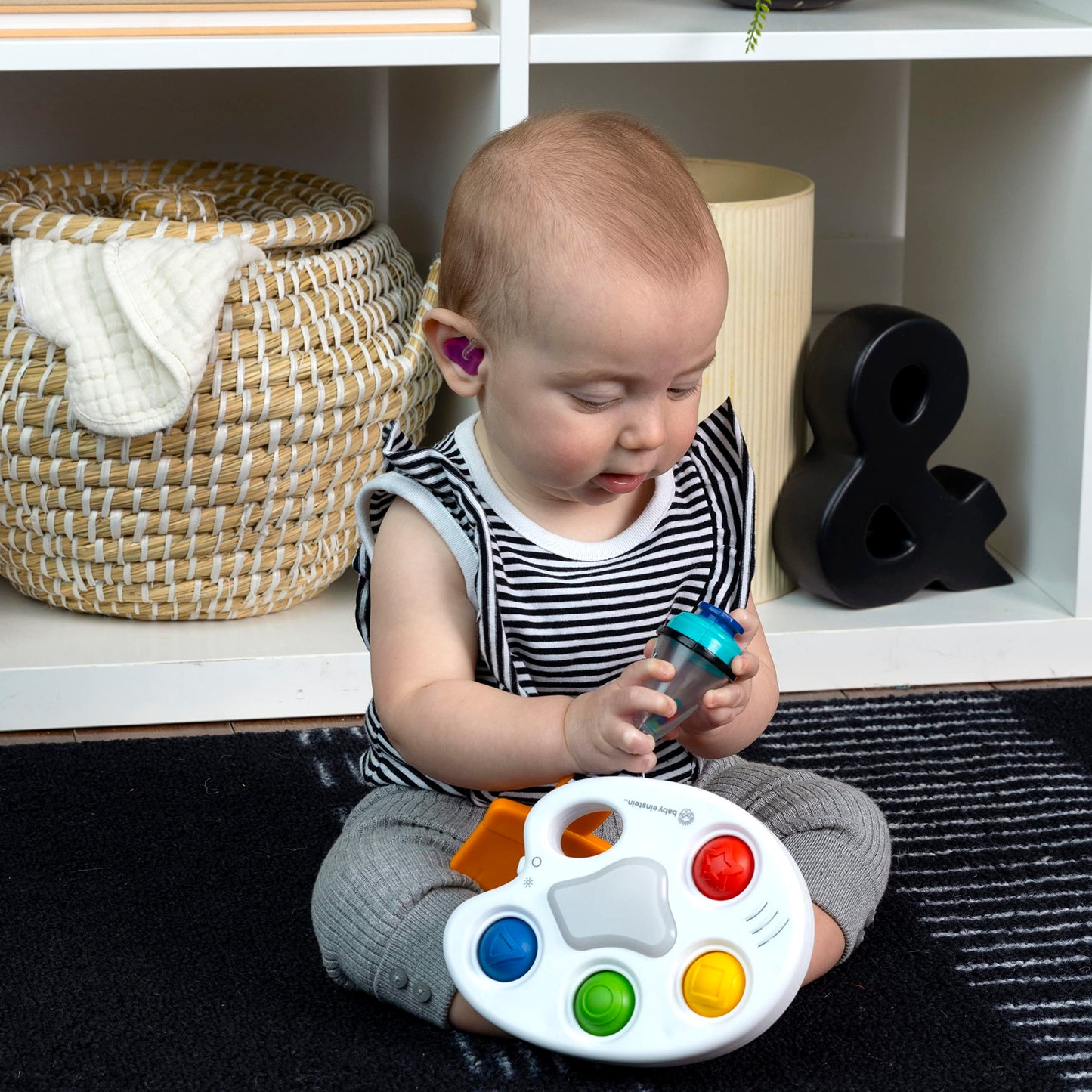 Baby Einstein Color Palette Popper sensory fidget toy for infants age 6 months and up, featuring colorful buttons for tactile play.