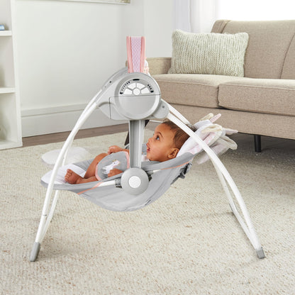 Ingenuity Comfort 2 Go Compact Portable 6-Speed Cushioned Baby Swing with Music, Folds Easy, 0-9 Months 6-20 lbs (Pink Flora the Unicorn)