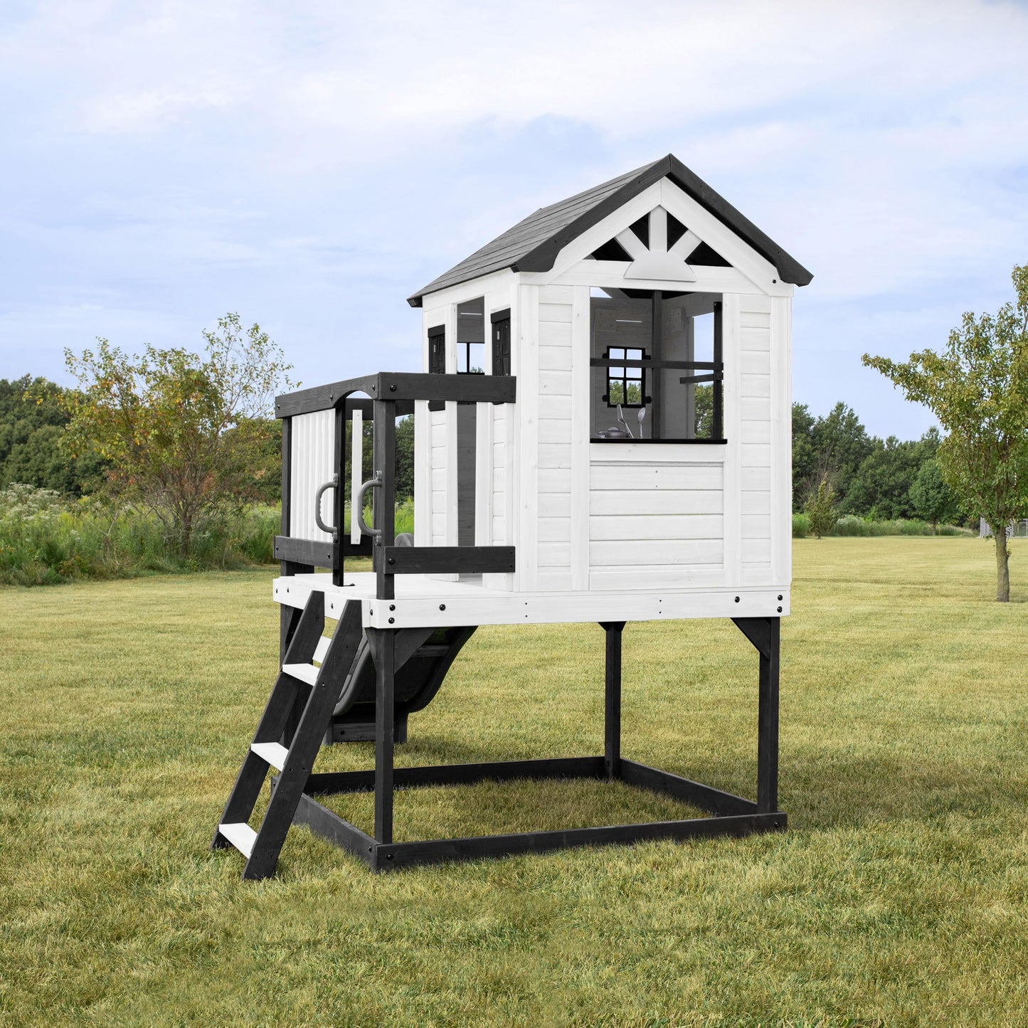 Backyard Discovery Sweetwater Heights cedar wood elevated playhouse with wave slide, toy kitchen, and growth chart for kids outdoor fun.