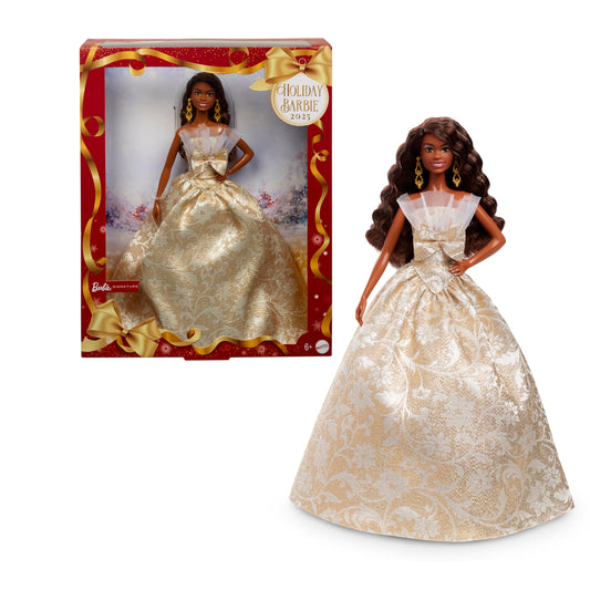 Barbie Signature 2025 Holiday doll with black hair in a silver and gold gown, elegantly displayed in collector packaging.