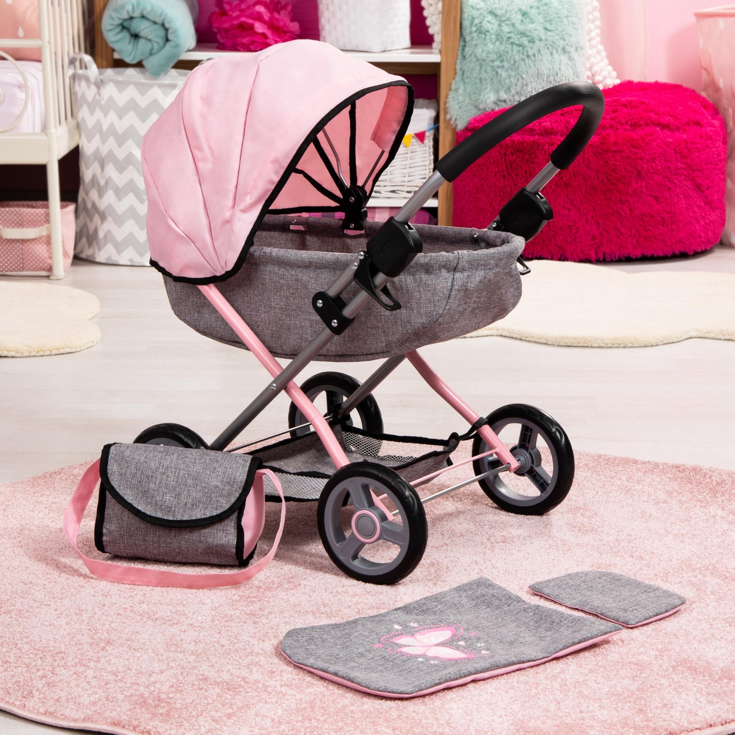 Bayer Cosy baby doll pram with large wheels, foldable design, storage basket, changing bag, and matching accessories for 46cm dolls.