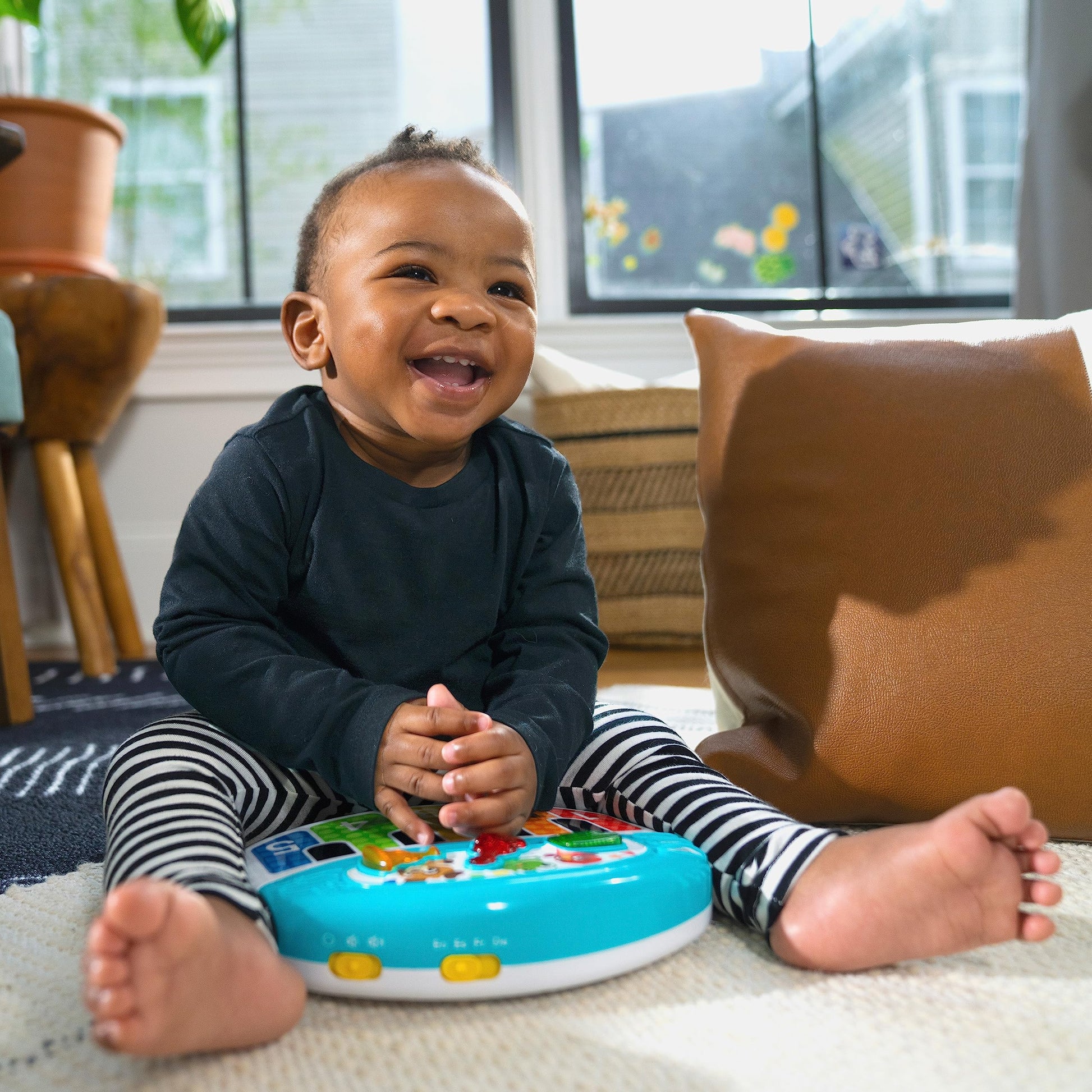 Baby Einstein Discover & Play Piano musical baby toy with colorful buttons for learning instruments, numbers, and animals in 3 languages.