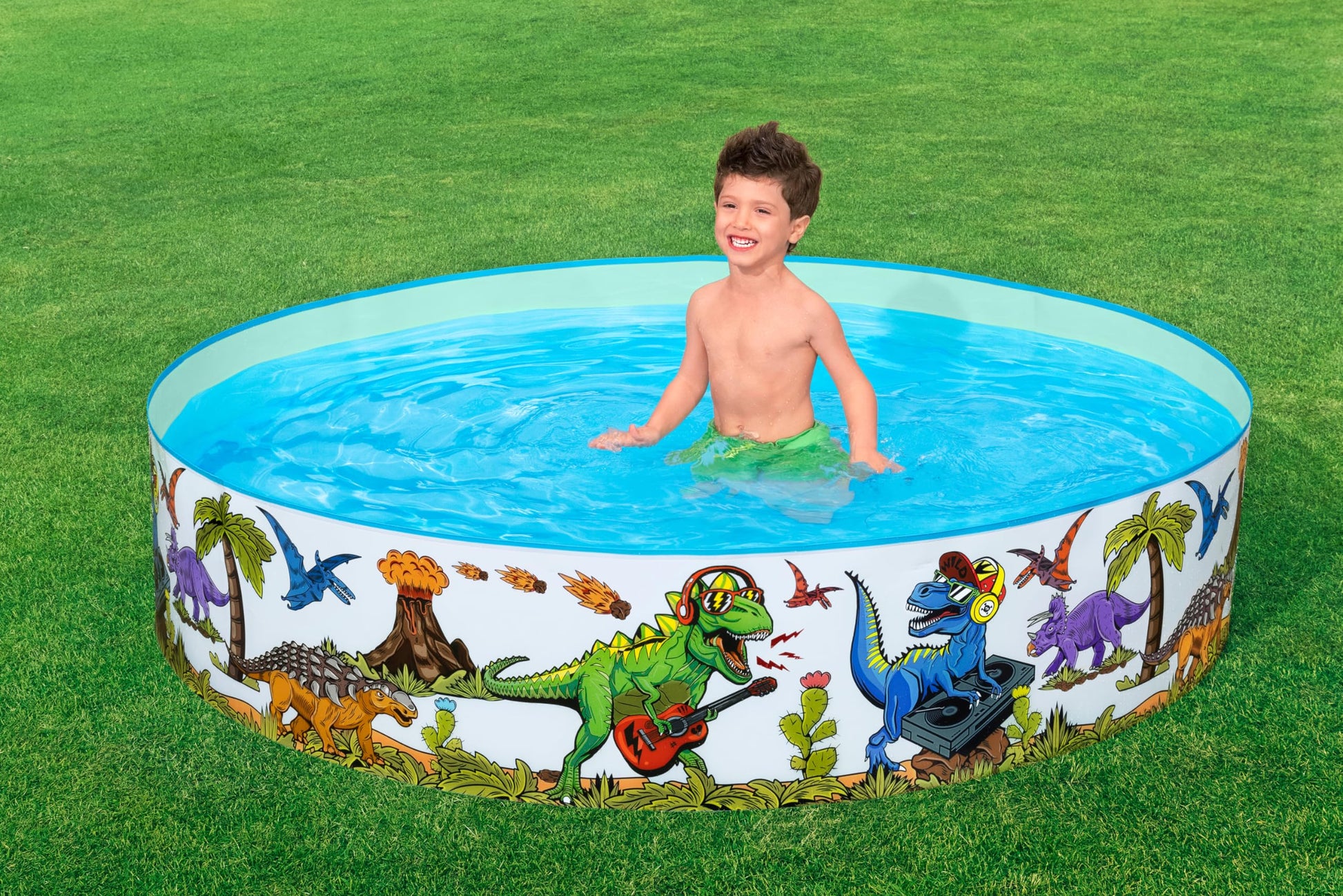 Bestway inflatable dinosaur paddling pool in outdoor garden setting, 183cm x 38cm, perfect for kids' summer fun.