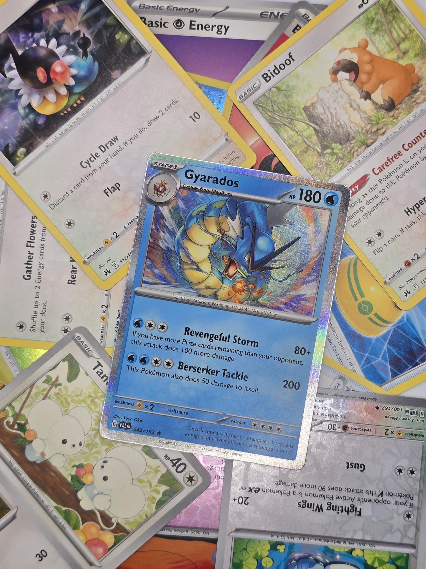 Assorted Pokémon cards featuring various characters, showcasing 50 collectible pieces in vibrant designs.