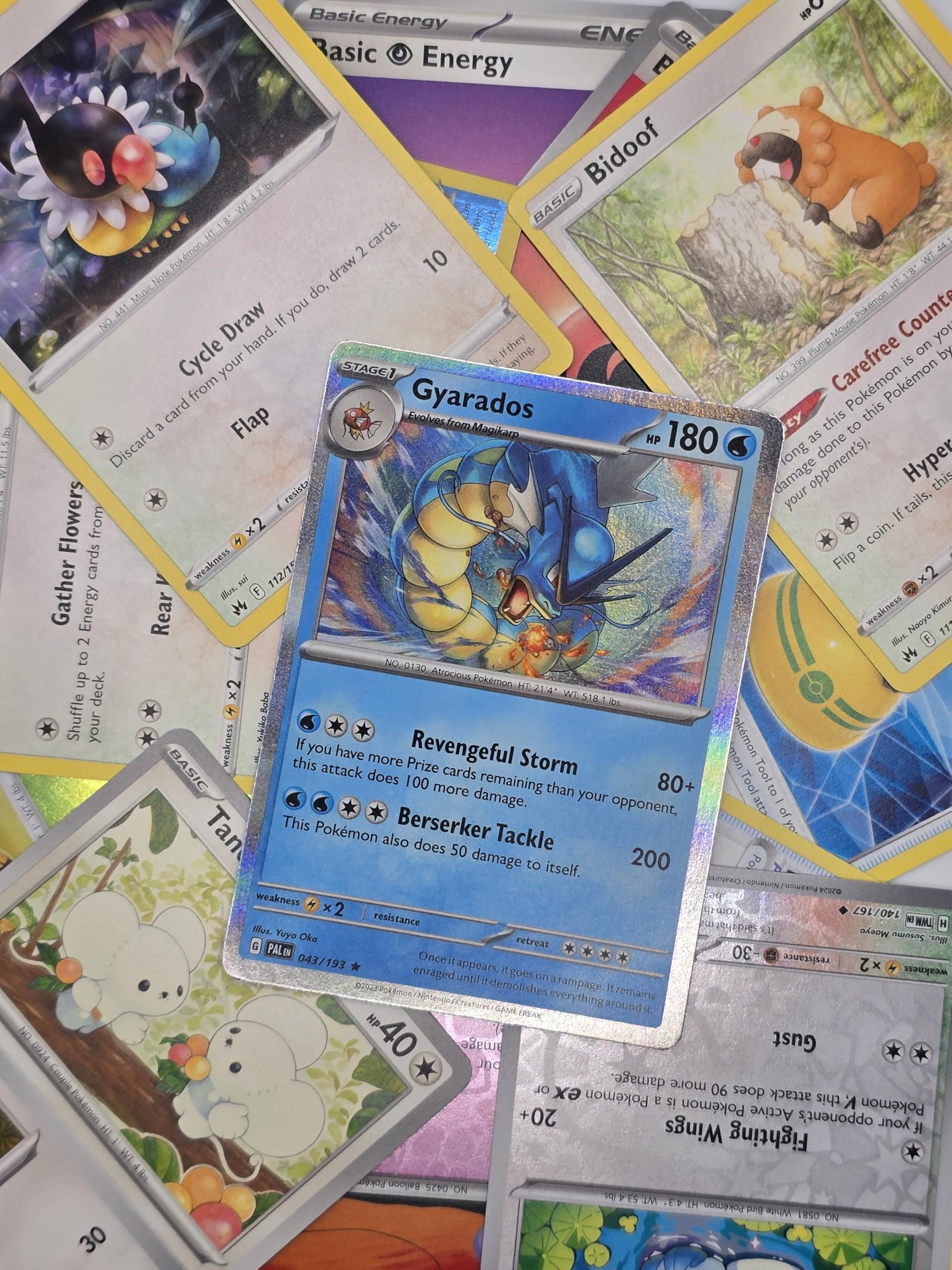 Assorted Pokémon cards featuring various characters, showcasing 50 collectible pieces in vibrant designs.