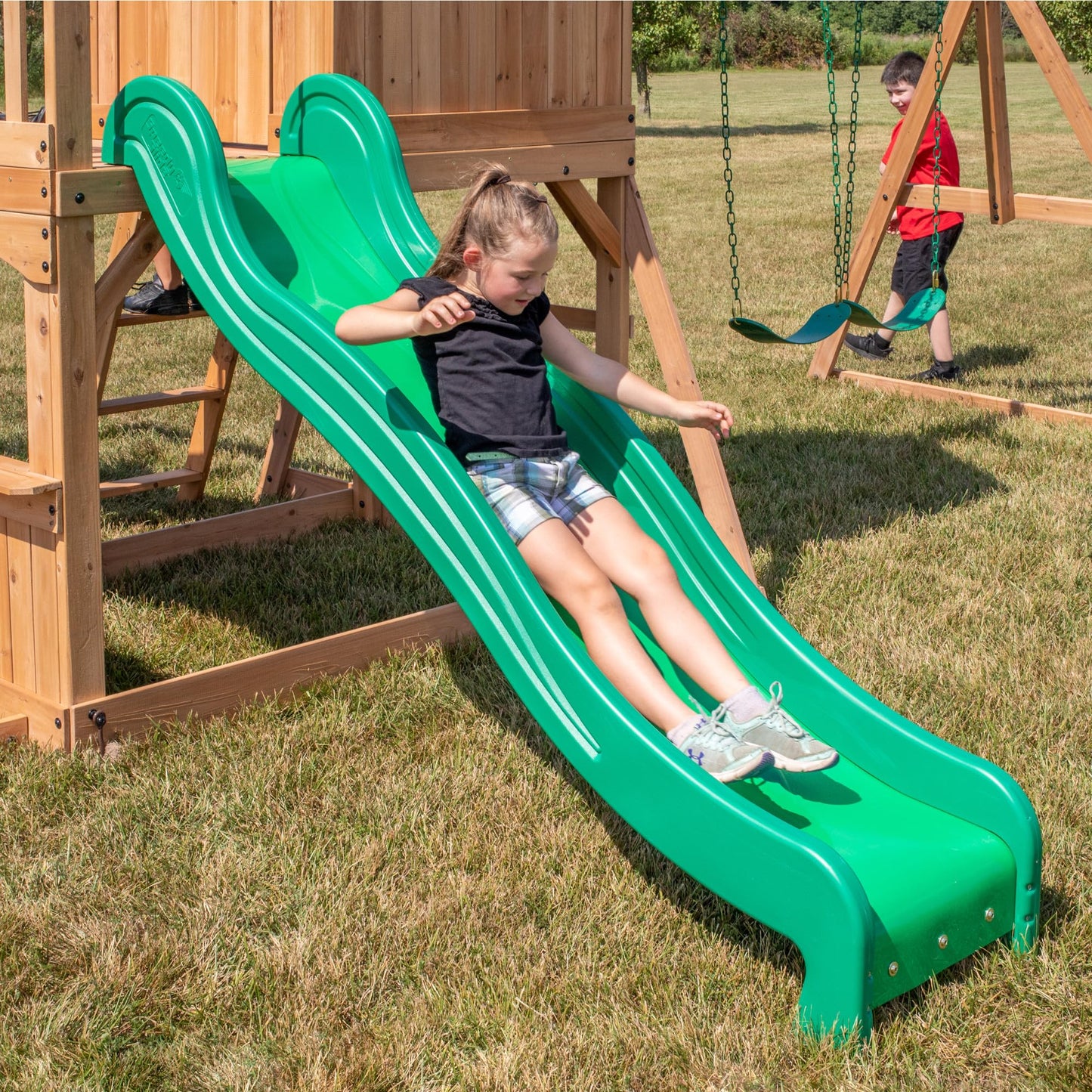 Backyard Discovery Montpelier 100% Cedar Wood Swing Set | Outdoor Playground for Kids | Garden Climbing Frame for Children | 1 Trapeze and 2 Belt Swings | 2.4m Wave Slide | Moneky Bars
