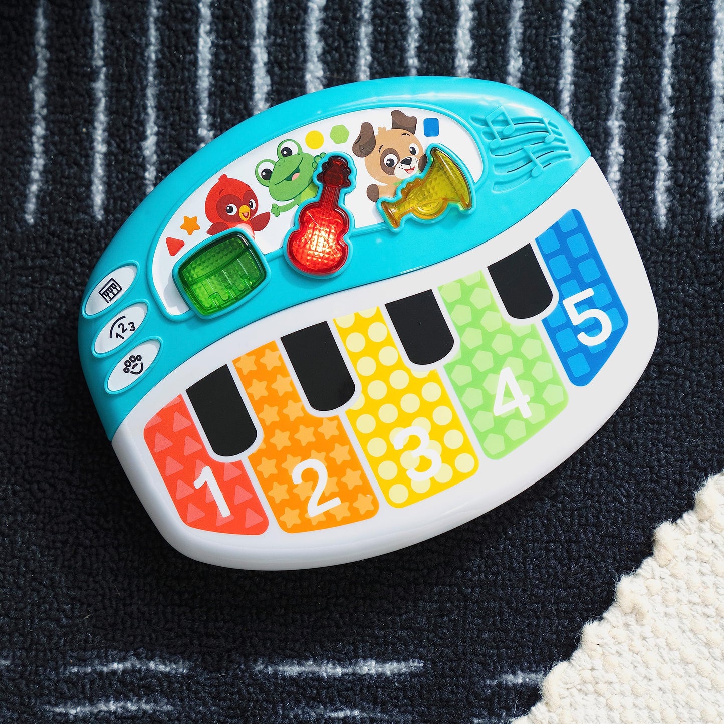 Baby Einstein Discover & Play Piano toy with colorful buttons, featuring animals, instruments, and numbers for infants aged 3 months+