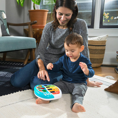 Baby Einstein Discover & Play Piano toy for babies, featuring colorful keys, animal illustrations, and multilingual learning functions.