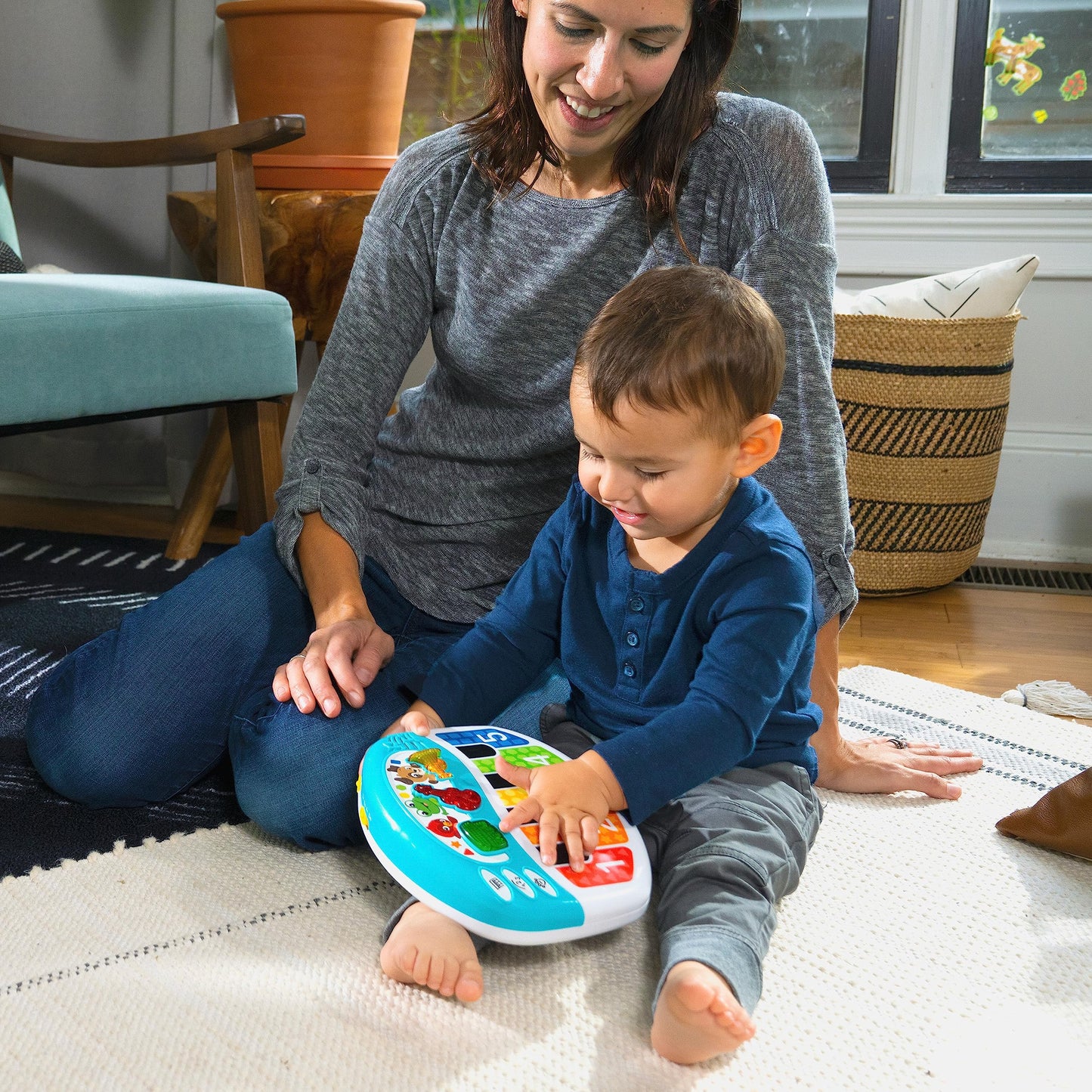 Baby Einstein Discover & Play Piano musical baby toy with colorful buttons and animal images for early learning and entertainment.